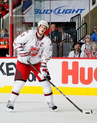 RALEIGH, NC - JANUARY 30:  Team Staal player Eric Staal #12 of the Carolina Hurricanes skates with the puck against Team Lidstrom in the 58th NHL All-Star Game at RBC Center on January 30, 2011 in Raleigh, North Carolina.  (Photo by Kevin C. Cox/Getty Ima
