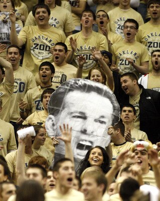 PITTSBURGH, PA - DECEMBER 11:  Pittsburgh Panthers fans hold up a picture of Jamie Dixon's head against the Tennessee Volunteers during the SEC/BIG EAST Invitational at Consol Energy Center on December 11, 2010 in Pittsburgh, Pennsylvania.The Volunteers d