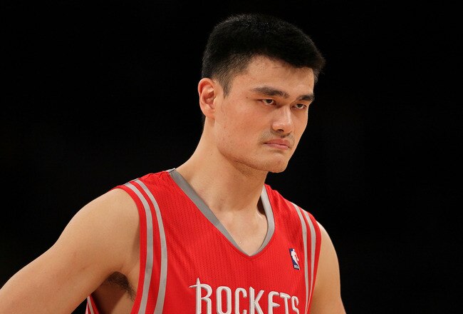 LOS ANGELES, CA - OCTOBER 26:  Yao Ming #11 of the Houston Rockets looks on during their opening night game against the Los Angeles Lakers at Staples Center on October 26, 2010 in Los Angeles, California. NOTE TO USER: User expressly acknowledges and agre