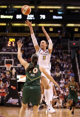 PHOENIX - SEPTEMBER 05:  Diana Taurasi #3 of the Phoenix Mercury puts up a three point shot over Sue Bird #10 of the Seattle Storm in Game Two of the Western Conference Finals during the 2010 WNBA Playoffs at US Airways Center on September 5, 2010 in Phoe