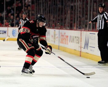 CHICAGO, IL - JANUARY 25: Patrick Kane #88 of the Chicago Blackhawks controls the puck against the Minnesota Wild at the United Center on January 25, 2011 in Chicago, Illinois. The Wild defeated the Blackhawks 4-2. (Photo by Jonathan Daniel/Getty Images)