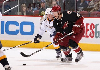 GLENDALE, AZ - JANUARY 18:  Shane Doan #19 of the Phoenix Coyotes skates with the puck during the NHL game against the Nashville Predators at Jobing.com Arena on January 18, 2011 in Glendale, Arizona.  The Predators defeated the Coyotes 5-2.  (Photo by Ch