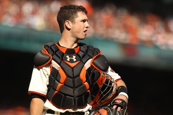 SAN FRANCISCO - OCTOBER 19:  Buster Posey #28 of the San Francisco Giants stands on the field during Game Three of the NLCS against the Philadelphia Phillies during the 2010 MLB Playoffs at AT&T Park on October 19, 2010 in San Francisco, California.  (Pho