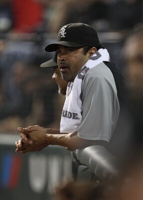 CHICAGO - AUGUST 10: Manager Ozzie Guillen #13 of the Chicago White Sox watches as his team takes on the Minnesota Twins at U.S. Cellular Field on August 10, 2010 in Chicago, Illinois. The Twins defeated the White Sox 12-6. (Photo by Jonathan Daniel/Getty