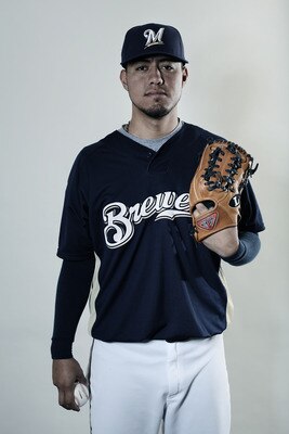 MARYVALE, AZ - MARCH 01:  (EDITORS NOTE: THIS IMAGES HAS BEEN DIGITALLY DESATURATED) Yovani Gallardo #49 poses for a portrait during the Milwaukee Brewers Photo Day at the Maryvale  Baseball Park on March 1, 2010 in Maryvale, Arizona.  (Photo by Jonathan 