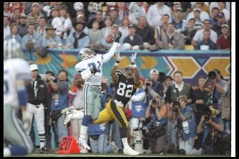 28 Jan 1996:  Defensive back Deion Sanders of the Dallas Cowboys (left) breaks up a pass intended for Pittsburgh Steelers wide receiver Yancey Thigpen during Super Bowl XXX at Sun Devil Stadium in Tempe, Arizona.  The Cowboys won the game, 27-17. Mandator