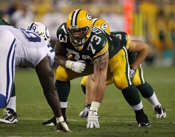 GREEN BAY, WI - AUGUST 26: Daryn Colledge #73 of the Green Bay Packers awaits the start of play against the Indianapolis Colts during a preseason game at Lambeau Field on August 26, 2010 in Green Bay, Wisconsin. The Packers defeated the Colts 59-24. (Phot