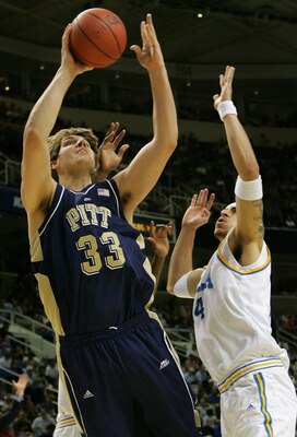 SAN JOSE, CA - MARCH 22:  Aaron Gray #33 of the Pittsburgh Panthers puts up a shot past Lorenzo Mata #14 of the UCLA Bruins during round three of the NCAA Men's Basketball Tournament at the HP Pavilion on March 22, 2007 in San Jose, California.  (Photo by