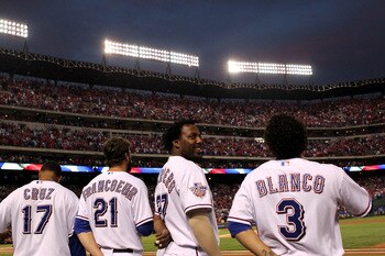 ARLINGTON, TX - NOVEMBER 01:  (L-R) Nelson Cruz #17, Jeff Francoeur #21, Vladimir Guerrero #27 and Elvis Andrus #1 of the Texas Rangers stand for the performance of the National Anthem against the San Francisco Giants in Game Five of the 2010 MLB World Se
