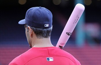 BOSTON - MAY 9:  Mike Lowell #25 of the Boston Red Sox prepares to take batting practice with a pink bat, a symbol to raise breast cancer awareness, before a game against the New York Yankees at Fenway Park on May 9, 2010 in Boston, Massachusetts. For Mot