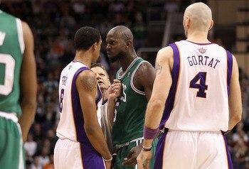 PHOENIX, AZ - JANUARY 28:  Kevin Garnett #5 of the Boston Celtics stares down Channing Frye #8 of the Phoenix Suns after Garnett was called for a technical foul during the NBA game at US Airways Center on January 28, 2011 in Phoenix, Arizona.  The Suns de