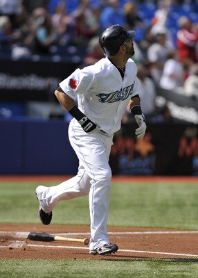 TORONTO - SEPTEMBER 23:   Jose Bautista #19 of the Toronto Blue Jays looks as his 50th home run of the season leaves the ball park during the game against the Seattle Mariners on September 23, 2010 at Rogers Centre in Toronto, Ontario, Canada. The Blue Ja