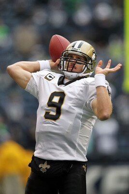 SEATTLE, WA - JANUARY 08:  Quarterback Drew Brees #9 of the New Orleans Saints throws the ball against the Seattle Seahawks during the 2011 NFC wild-card playoff game at Qwest Field on January 8, 2011 in Seattle, Washington.  (Photo by Jonathan Ferrey/Get