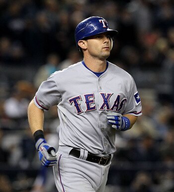 NEW YORK - OCTOBER 19:  Michael Young #10 of the Texas Rangers runs towards first base against the New York Yankees in Game Four of the ALCS during the 2010 MLB Playoffs at Yankee Stadium on October 19, 2010 in the Bronx borough of New York City.  (Photo