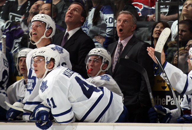 LOS ANGELES, CA - JANUARY 10: Head coach Ron Wilson (R) of the Toronto Maple Leafs reacts to a scoreboard video replay during the game against the Los Angeles Kings at the Staples Center on January 10, 2011 in Los Angeles, California. The Leafs defeated t