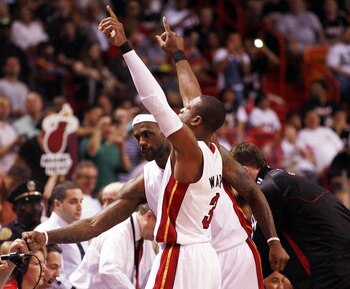 MIAMI - FEBRUARY 06:  Forward LeBron James #6 and Guard Dwyane Wade #3 of the Miami Heat is introduced against the L.A. Clippers at American Airlines Arena on February 6, 2011 in Miami, Florida. The Heat defeated the Clippers 97-79. NOTE TO USER: User exp