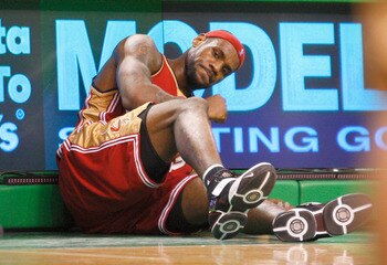 BOSTON, MA - FEBRUARY 27:   LeBron James #23 of the Cleveland Cavaliers reacts after suffering an in injury against the Boston Celtics at the TD Banknorth Garden on February 27, 2008 in Boston, Massachusetts. NOTE TO USER: User expressly acknowledges and