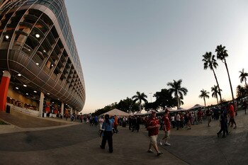 MIAMI - JANUARY 08:   Fans walk around outside the stadium prior to the FedEx BCS National Championship game between the Oklahoma Sooners and the Florida Gators at Dolphin Stadium on January 8, 2009 in Miami, Florida.  (Photo by Doug Benc/Getty Images)