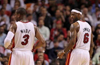 MIAMI, FL - FEBRUARY 08: LeBron James #6 of the Miami Heat looks at Dwyane Wade #3 during a game against the Indiana Pacers at American Airlines Arena on February 8, 2011 in Miami, Florida. NOTE TO USER: User expressly acknowledges and agrees that, by dow