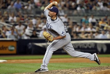 NEW YORK - JULY 16:  Joaquin Benoit #53 of the Tampa Bay Rays pitches against the New York Yankees on July 16, 2010 at Yankee Stadium in the Bronx borough of New York City. The Yankees defeated the Rays 5-4.  (Photo by Jim McIsaac/Getty Images)
