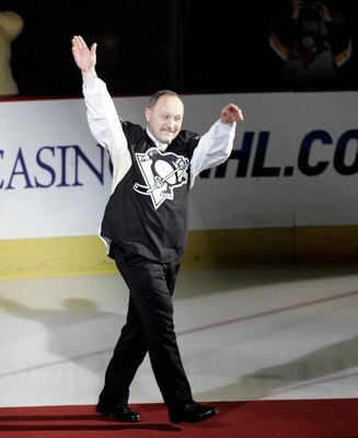 PITTSBURGH, PA - APRIL 08:  Penguins alumni Bryan Trottier waves to the crowd during the pre game ceremony to celebrate the final regular season game at Mellon Arena on April 8, 2010 in Pittsburgh, Pennsylvania.  The Penguins defeated the Islanders 7-3.