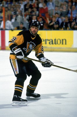 INGLEWOOD, CA - 1990:  Phil Bourque #29 of the Pittsburgh Penguins skates against the Los Angeles Kings during a 1990-91 season NHL game at the Great Western Forum in Inglewood, California.  (Photo by Ken Levine/Getty Images)