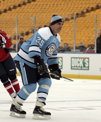 PITTSBURGH, PA - DECEMBER 31:  Kevin Stevens #25 of the Pittsburgh Penguins skates against the Washington Capitals during the 2011 NHL Winter Classic Alumni Game on December 31, 2010 at Heinz Field in Pittsburgh, Pennsylvania.  (Photo by Justin K. Aller/G