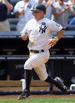 NEW YORK - JULY 18:  Brett Gardner #11 of the New York Yankees runs against the Tampa Bay Rays on July 18, 2010 at Yankee Stadium in the Bronx borough of New York City.  (Photo by Jim McIsaac/Getty Images)