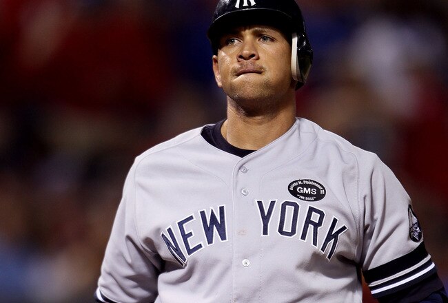 ARLINGTON, TX - OCTOBER 22:  Alex Rodriguez #13 of the New York Yankees reacts against the Texas Rangers in Game Six of the ALCS during the 2010 MLB Playoffs at Rangers Ballpark in Arlington on October 22, 2010 in Arlington, Texas.  (Photo by Elsa/Getty I