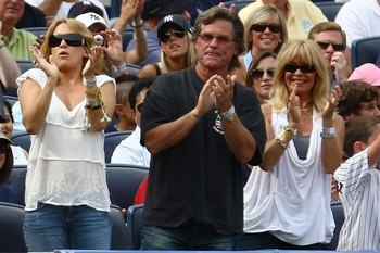 NEW YORK - AUGUST 08:  Kate Hudson, Kurt Russell and Goldie Hawn clap as Alex Rodriguez of the New York Yankees steps up to bat against the Boston Red Sox during their game on August 8, 2009 at Yankee Stadium in the Bronx borough of New York City.  (Photo