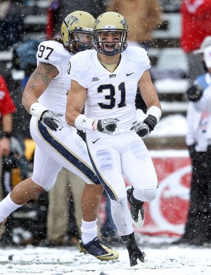 CINCINNATI, OH - DECEMBER 04:  Dom Decicco #31 of the Pittsburgh Panthers celebrates after intercepting a pass during the Big East Conference game against the Cincinnati Bearcats at Nippert Stadium on December 4, 2010 in Cincinnati, Ohio.  Pittsburgh won