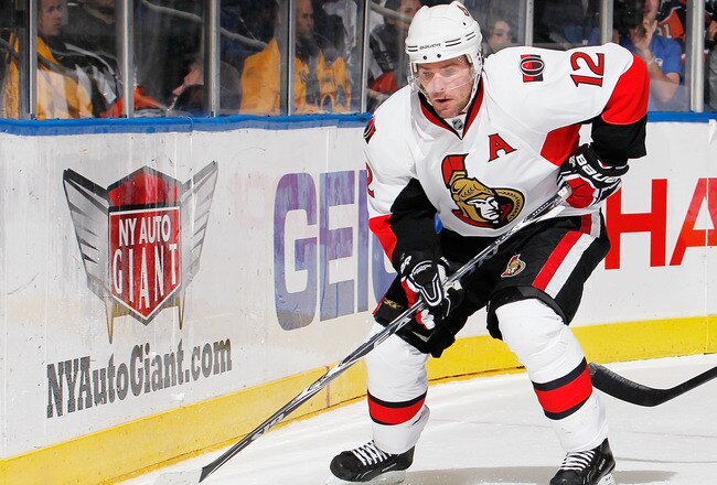 UNIONDALE, NY - JANUARY 13:  Mike Fisher #12 of the Ottawa Senators skates during an NHL hockey game against the New York Islanders at the Nassau Coliseum on January 13, 2011 in Uniondale, New York.  (Photo by Paul Bereswill/Getty Images)