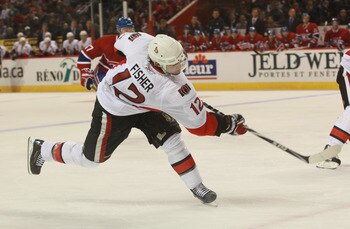 MONTREAL, QC - SEPTEMBER 24:  Mike Fisher #12 of the Ottawa Senators skates against the Montreal Canadiens at the Bell Centre on September 24, 2010 in Montreal, Canada. The Canadiens defeated the Senators 4-2.  (Photo by Bruce Bennett/Getty Images)