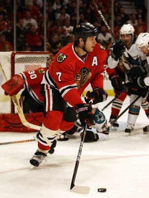 CHICAGO, IL - DECEMBER 30: Brent Seabrook #7 of the Chicago Blackhawks looks to pass after clearing  the puck against the San Jose Sharks at the United Center on December 30, 2010 in Chicago, Illinois. The Sharks defeated the Blackhawks 5-3. (Photo by Jon