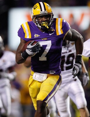 BATON ROUGE, LA - NOVEMBER 13:  Patrick Peterson #7 of the Louisiana State University Tigers runs back an interception against the Louisiana Monroe Warhawks at Tiger Stadium on November 13, 2010 in Baton Rouge, Louisiana.  (Photo by Chris Graythen/Getty I