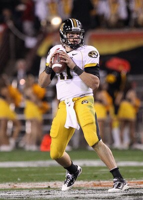 TEMPE, AZ - DECEMBER 28:  Quarterback Blaine Gabbert #11 of the Missouri Tigers drops back to pass during the Insight Bowl against the Iowa Hawkeyes  at Sun Devil Stadium on December 28, 2010 in Tempe, Arizona.  The Hawkeyes defeated the Tigers 27-24.  (P