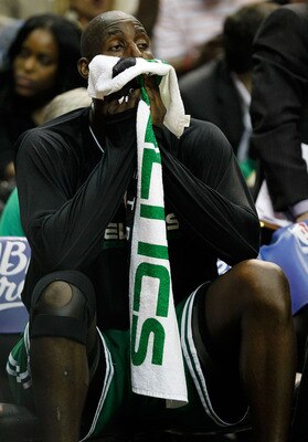 ORLANDO, FL - MAY 26:  Kevin Garnett #5 of the Boston Celtics wipes his face with a towel on the bench against the Orlando Magic in Game Five of the Eastern Conference Finals during the 2010 NBA Playoffs at Amway Arena on May 26, 2010 in Orlando, Florida.
