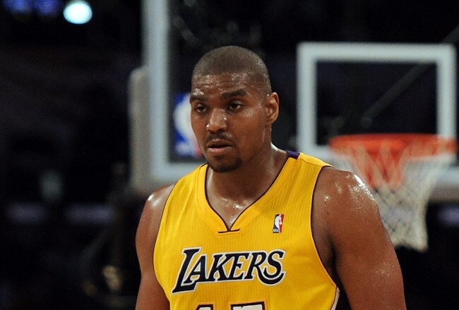 LOS ANGELES, CA - FEBRUARY 03:  Pau Gasol #16, Andrew Bynum #17, Kobe Bryant #24 and Derek Fisher #2 of the Los Angeles Lakers head to the bench after a time out trailing the San Antonio Spurs during the second half at Staples Center on February 3, 2011 i