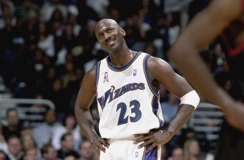 WASHINGTON - NOVEMBER 3:  Forward Michael Jordan #23 of the Washington Wizards looks at the scoreboard during the NBA game against the Philadelphia 76ers at MCI Center in Washington, D.C. on November 3, 2001.  The Wizards won 90-76.  NOTE TO USER: User ex