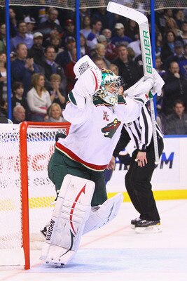 ST. LOUIS, MO - FEBRUARY 11: Jose Theodore #60 of the Minnesota Wild celebrates a victory against the St. Louis Blues at the Scottrade Center on February 11, 2011 in St. Louis, Missouri.  The Wild won 5-4 in a shootout.  (Photo by Dilip Vishwanat/Getty Im