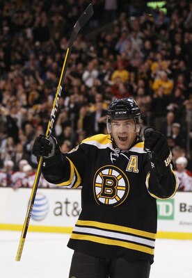 BOSTON, MA - FEBRUARY 09:  Mark Recchi #28 of the Boston Bruins celebrates teammate Brad Marchand's goal in the first period against the Montreal Canadiens on February 9, 2011 at the TD Garden in Boston, Massachusetts.  (Photo by Elsa/Getty Images)