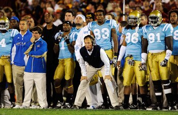 LOS ANGELES, CA - NOVEMBER 28:  Head coach Rick Neuheisel of the UCLA Bruins follows the action from the sideline against USC Trojans during the first quarter of the NCAA college football game at Los Angeles Memorial Coliseum on November 28, 2009 in Los A