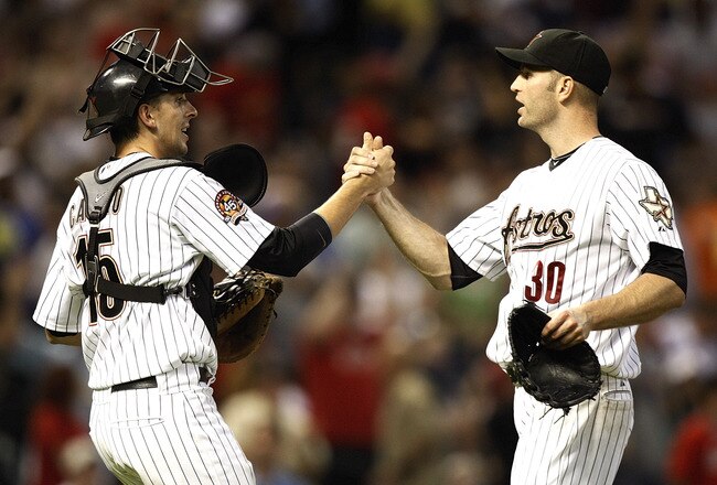 HOUSTON - AUGUST 30:  Catcher Jason Castros #15 and pitcher J.A. Happ #30 of the Houston Astros shake hands after the final out against the St. Louis Cardinals at Minute Maid Park on August 30, 2010 in Houston, Texas. The Astros beat the Cardinals 3-0.  (