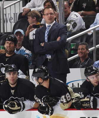 PITTSBURGH - OCTOBER 07: Coach Dan Bylsma of the Pittsburgh Penguins watches the action against the Philadelphia Flyers at the Consol Energy Center on October 7, 2010 in Pittsburgh, Pennsylvania.  (Photo by Bruce Bennett/Getty Images)