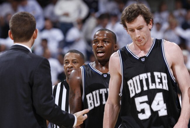 CINCINNATI, OH - DECEMBER 9: Shelvin Mack #1 and Matt Howard #54 of the Butler Bulldogs come off the floor during a timeout in the game against the Xavier Musketeers at Cintas Center on December 9, 2010 in Cincinnati, Ohio. Xavier defeated Butler 51-49. (
