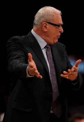 LOS ANGELES, CA - FEBRUARY 25:   Head coach Phil Jackson of the Los Angeles Lakers complains to a referee during the game with the Los Angeles Clippers at Staples Center on February 25, 2011 in Los Angeles, California. The Lakers won 108-95.  NOTE TO USER