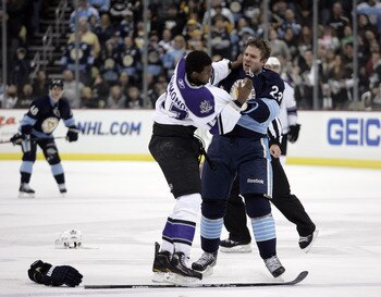 PITTSBURGH, PA - FEBRUARY 10:  Wayne Simmonds #17 of the Los Angeles Kings mixes it up with Ryan Craig #23 of the Pittsburgh Penguins at Consol Energy Center on February 10, 2011 in Pittsburgh, Pennsylvania.  (Photo by Justin K. Aller/Getty Images)