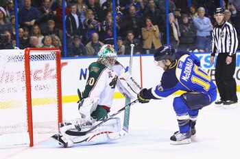 ST. LOUIS, MO - FEBRUARY 11: Jose Theodore #60 of the Minnesota Wild makes a save against Andy McDonald #10 of the St. Louis Blues during a shootout at the Scottrade Center on February 11, 2011 in St. Louis, Missouri.  The Wild won 5-4 in a shootout.  (Ph