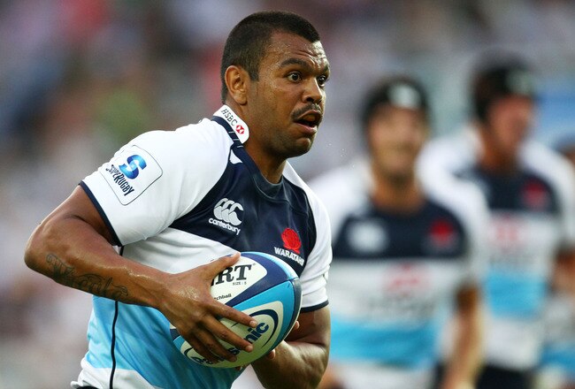 SYDNEY, AUSTRALIA - FEBRUARY 04: Kurtley Beale of the Waratahs runs the ball during the Super Rugby trial match between the Waratahs and Fiji Warriors at Sydney Football Stadium on February 4, 2011 in Sydney, Australia.  (Photo by Mark Nolan/Getty Images)