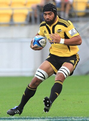 WELLINGTON, NEW ZEALAND - FEBRUARY 18:  Victor Vito of the Hurricanes runs the ball during the round one Super Rugby match between the Hurricanes and the Highlanders at Westpac Stadium on February 18, 2011 in Wellington, New Zealand.  (Photo by Marty Melv